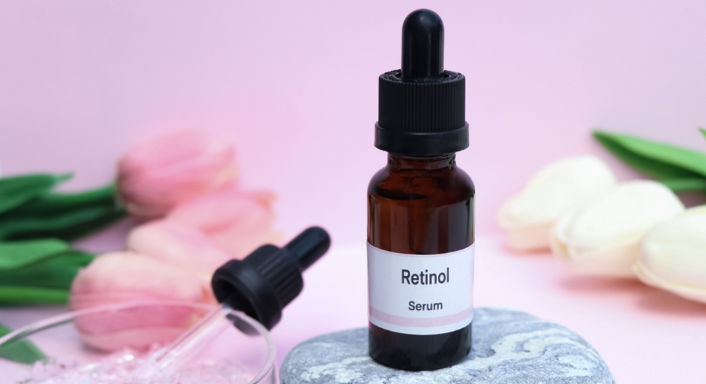 A bottle of retinol serum with glowing skin background